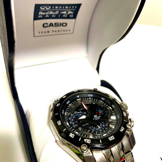 Red Bull Casio Watch Model 5147 with silver round dial and stainless steel band on white background