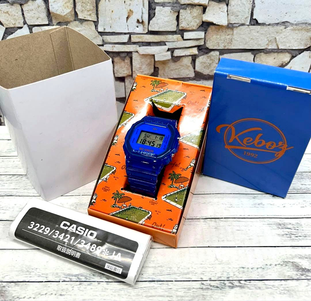 Casio G-Shock DW-5600KEBOZ22-2JR KeboZ collaboration digital watch with clear blue resin and silver hardware