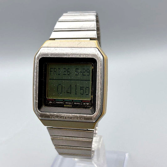 Casio VDB-1000 Data Bank watch with touch screen and replaced battery showing a black square face and futuristic design