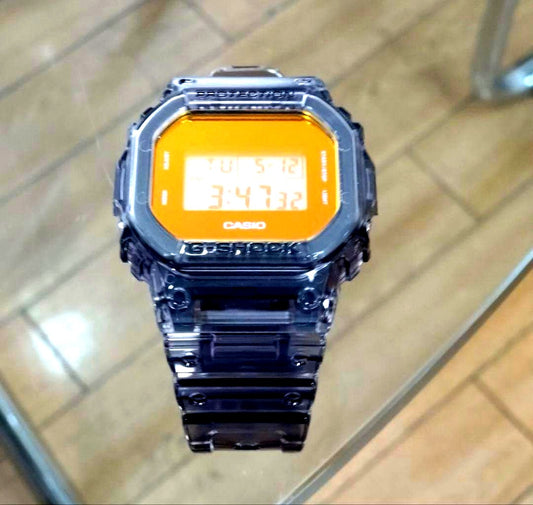 Casio G-Shock DW-5600TLS Beach Time Lapse Series watch with gradient vapor deposition glass and orange accents