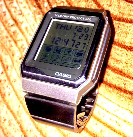 Casio VDB-2000 screen watch in used excellent condition showing the display and band
