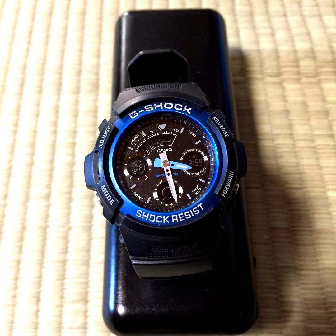 Casio G-Shock AW-591 black and blue resin quartz watch with round dial and water resistance
