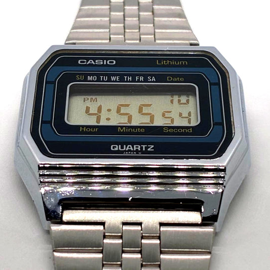 Casio B817 vintage wristwatch showing day and date, with clean case and original strap