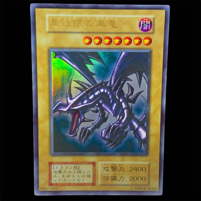Used Yugioh Red-Eyes Black Dragon Ultra Rare card from initial Japanese set with good centering and condition