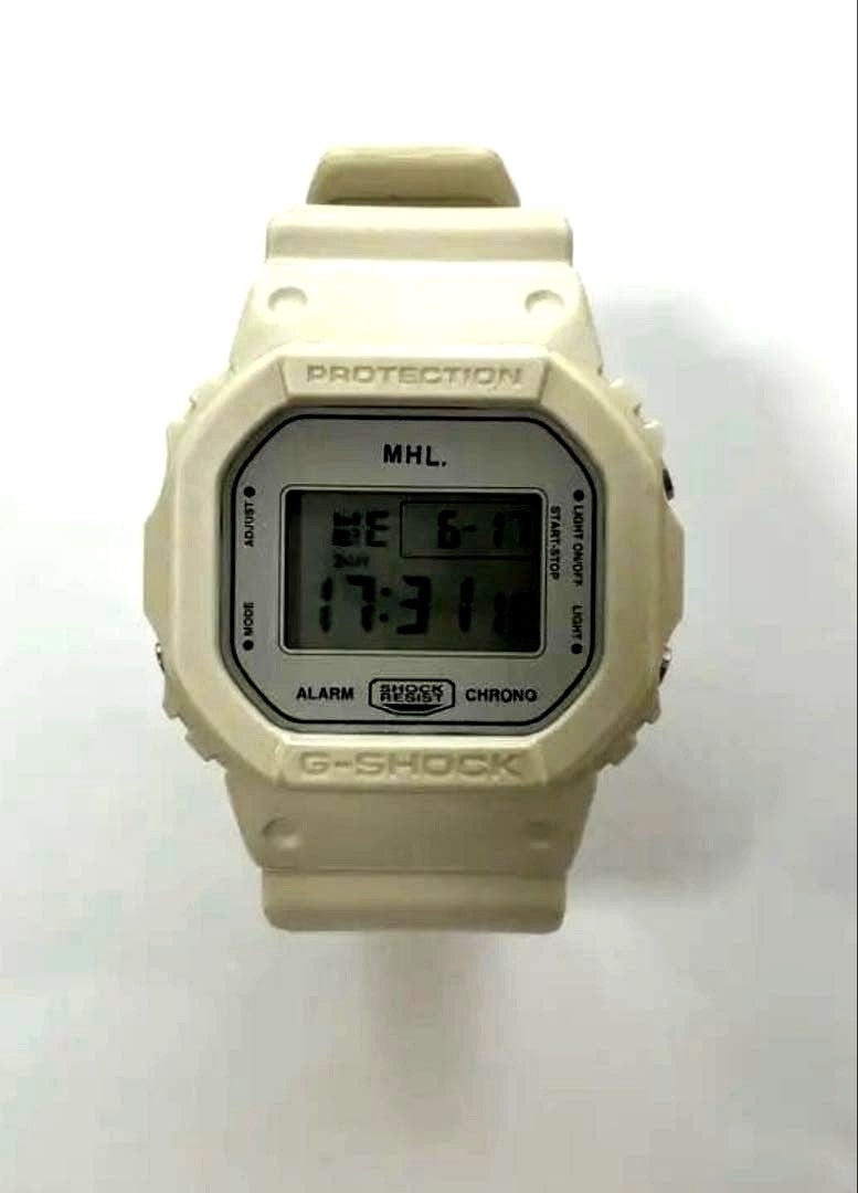 Casio G-Shock Margaret Howell collaboration white watch showing the dial and band with slight yellowing