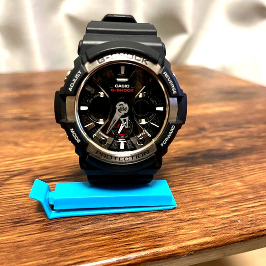 Casio G-Shock GA-200 used wristwatch showing clean condition with black and red design