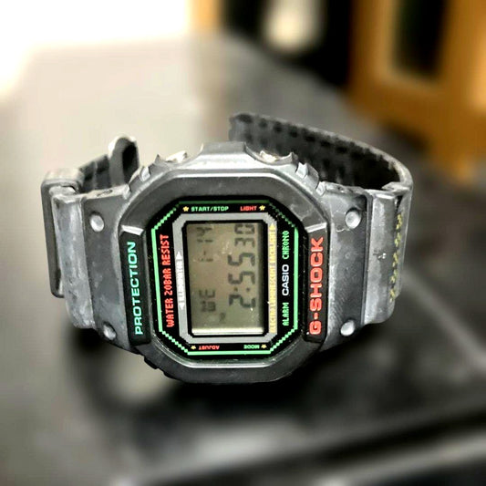Used Casio G-Shock DW-5600LG digital wristwatch with signs of use and no accessories