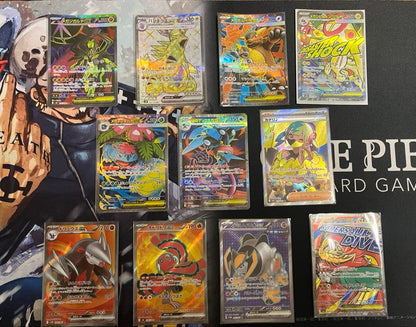 Bulk set of rare and promotional Pokemon cards stored in protective sleeves