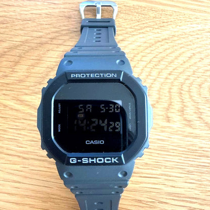 Casio G-Shock DW-5610UU-8JF grey waterproof watch with digital display and durable design