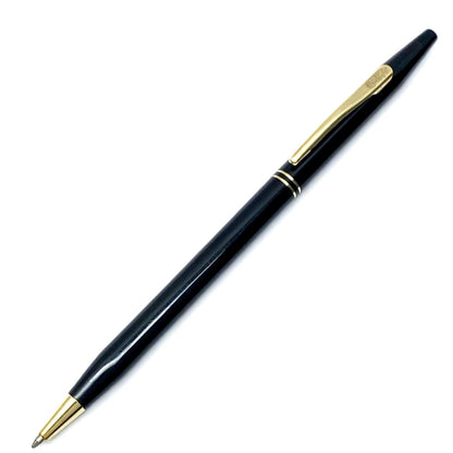 Cross Slim black ballpoint pen with twist mechanism and black ink, showing slight wear