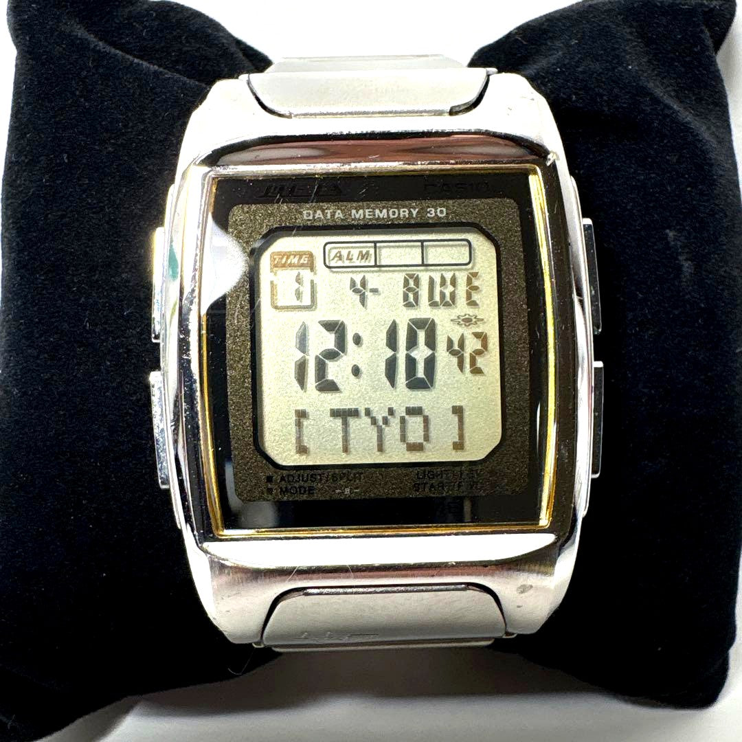 Casio Meta World Time Data Bank Model 1828 silver watch with digital display and metal band