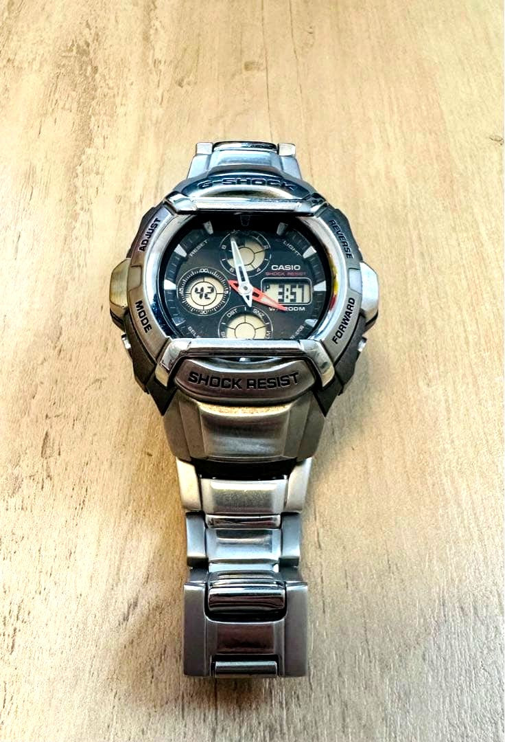 Casio G-Shock stainless steel silver watch with shock resistance and G-Shock logo on back case