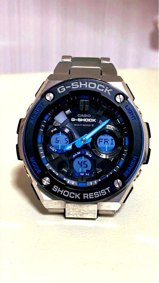 Casio G-Shock GST-W100D-1A2JF watch with analog-digital display and metal band