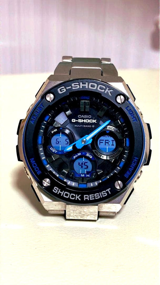 Casio G-Shock GST-W100D-1A2JF watch with analog-digital display and metal band