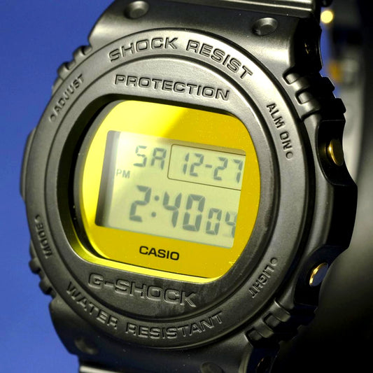 Casio G-Shock DW-5700BBMB-1JF watch with silver and gold electroplated mirror dial and matte black resin band