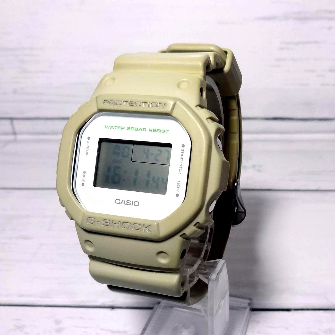 Casio G-Shock DW-5600M outdoor watch in natural beige color with digital display and shock resistance