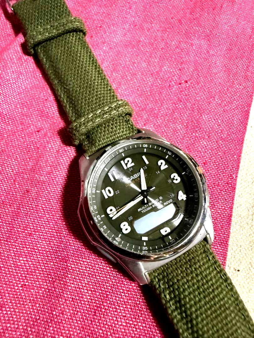 Casio Multiband 6 Series watch with green canvas strap and dark gray dial Japan import