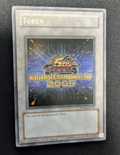 KONAMI Token TKN4-EN001 2009 Ultra Rare Trading Card with crease on back limited Canada import