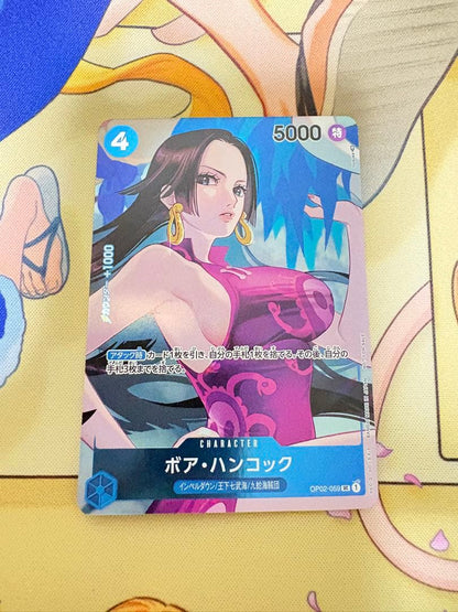 One Piece Boa Hancock OP02-059 card from OP-02 Top Battle series in protective sleeve