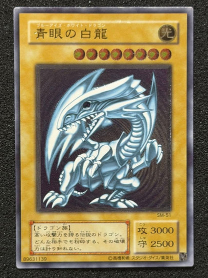 Blue-Eyes White Dragon Ultimate Rare Relief trading card with minor white paint missing on edges