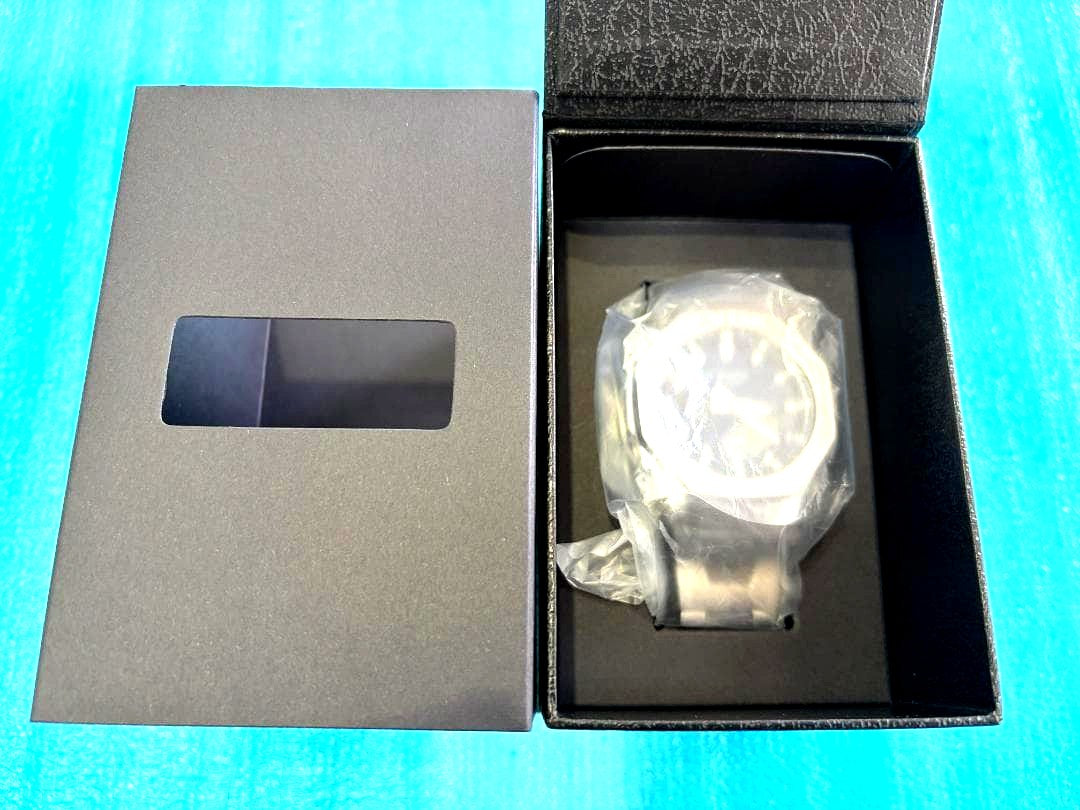 Casio G-Shock GM-2110D-2BJF men's watch with stainless steel bezel and band, blue dial, and digital-analog display