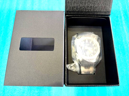 Casio G-Shock GM-2110D-2BJF men's watch with stainless steel bezel and band, blue dial, and digital-analog display