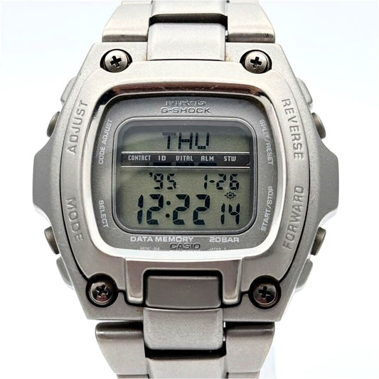 Casio MRG-210T vintage digital watch with 42mm stainless steel case showing signs of use