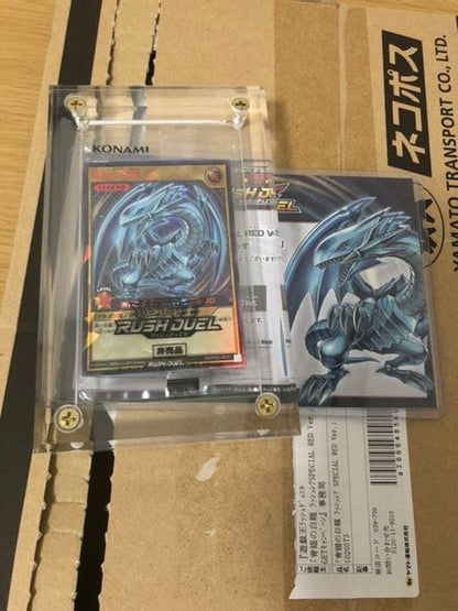 Yugioh Blue-Eyes White Dragon Red trading card with winning notification