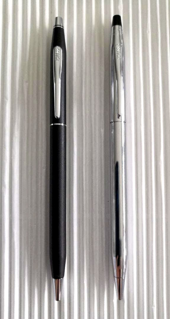 Set of two Cross ballpoint pens with matte black and chrome twist-style finish