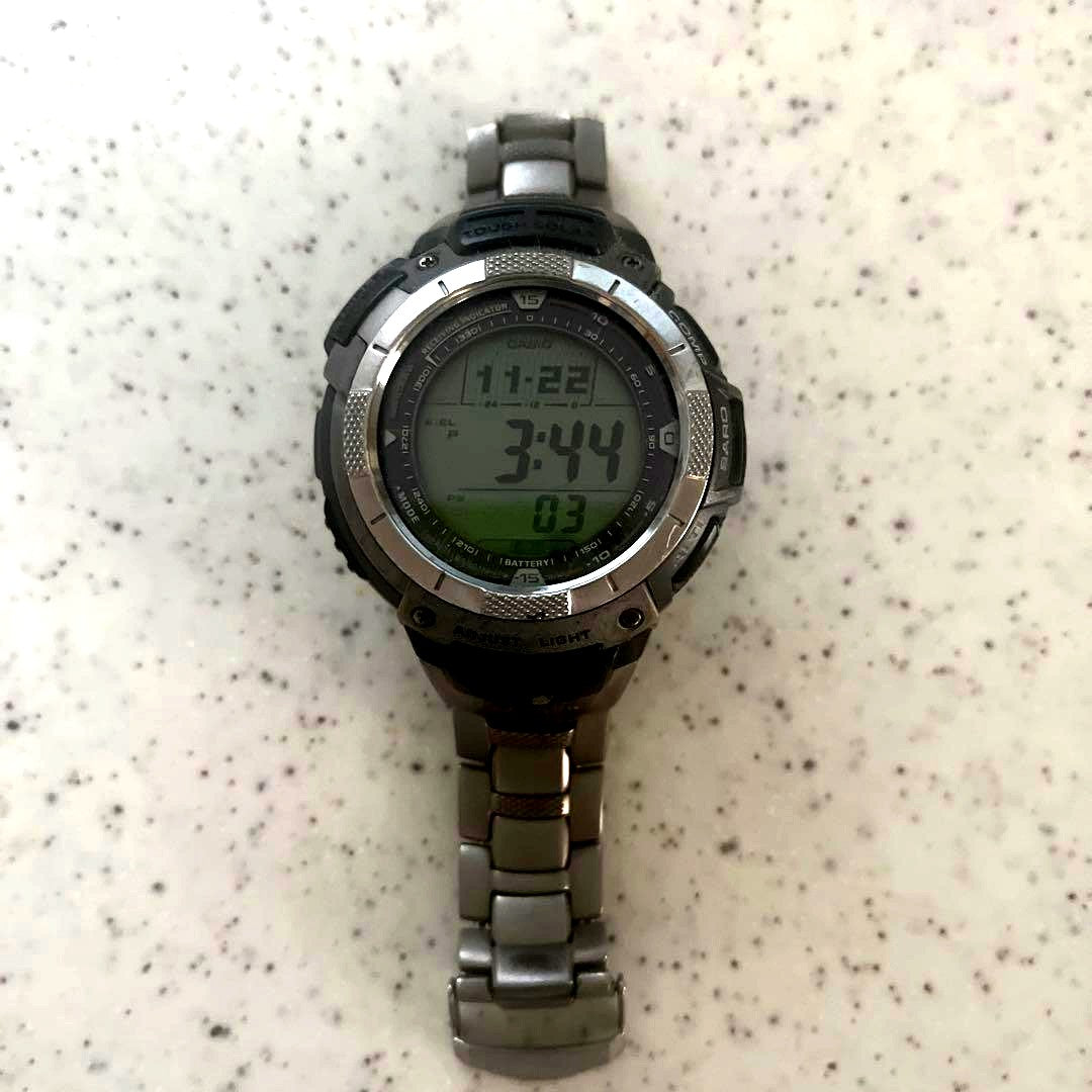 Used Casio Pro Trek PRW-1000TJ titanium belt radio solar watch with visible wear Japan import