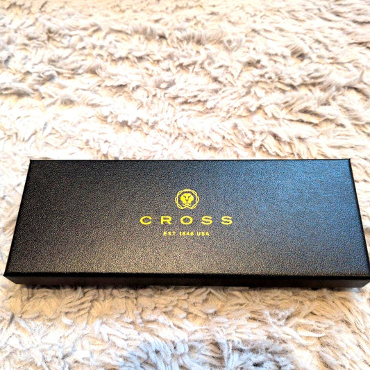 Cross ballpoint pen with clear silver body and gold contrasting accents