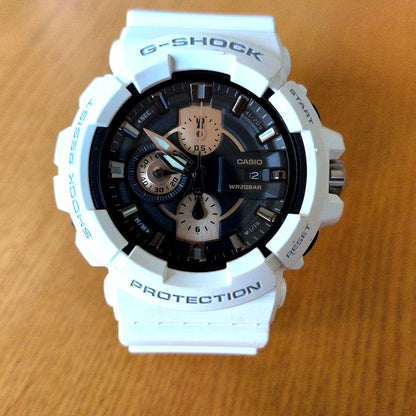 Casio G-Shock White GAC-100RG watch with replaced battery and minor yellowing on strap