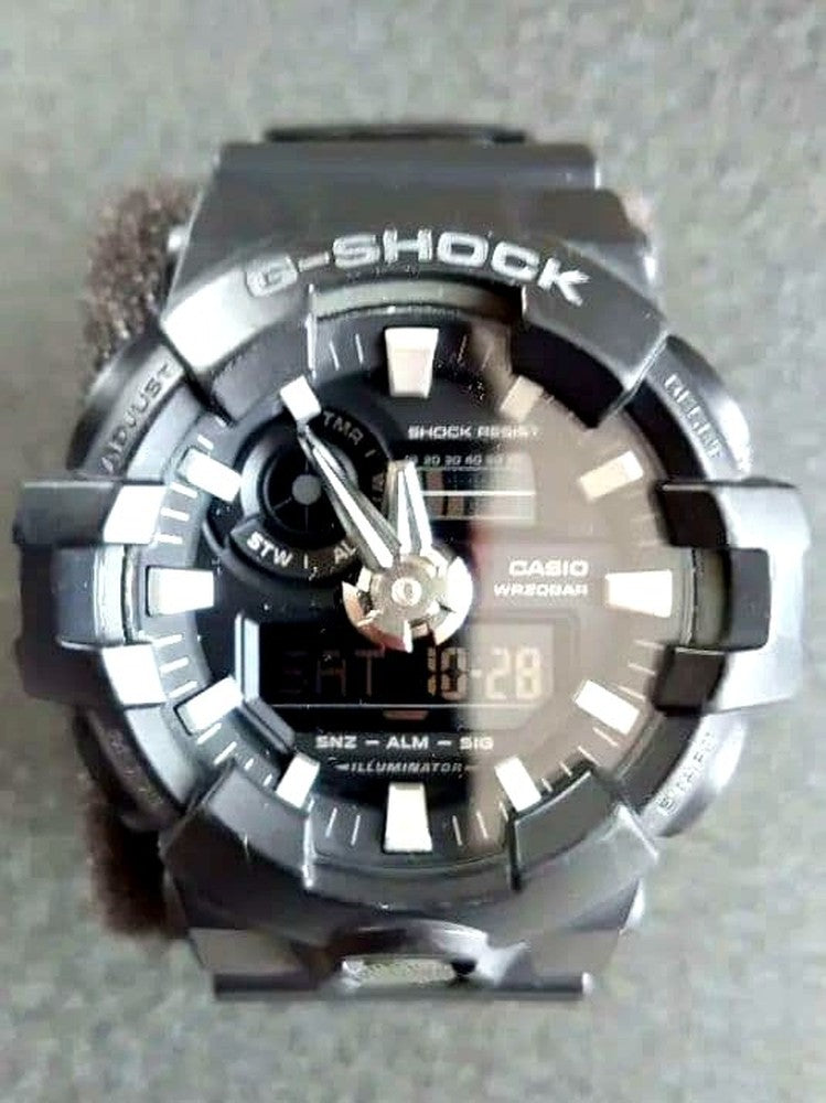 Casio G-Shock used watch showing minor scratches with original box and instruction manual