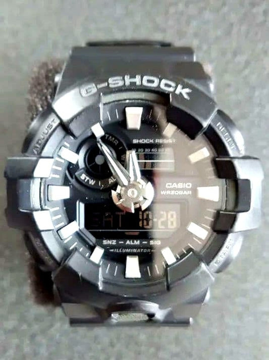 Casio G-Shock used watch showing minor scratches with original box and instruction manual