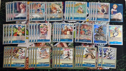 One Piece Card Game Blue Nami Deck and 3 bonus cards with black sleeves displayed