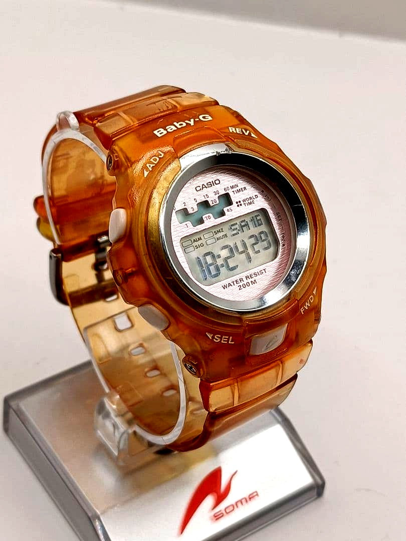 Casio Baby-G BG-1001 digital watch with skeleton orange design and black strap