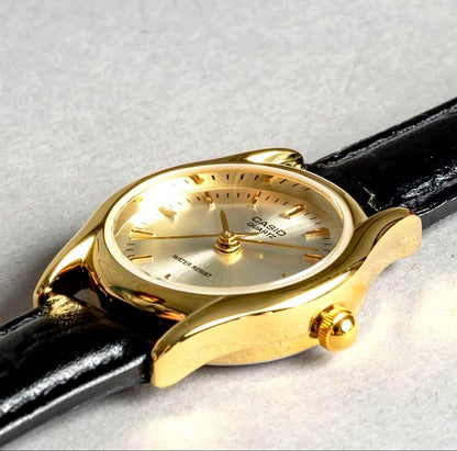 Casio LTP-1094Q-7A vintage analog watch with gold brass case and genuine leather band
