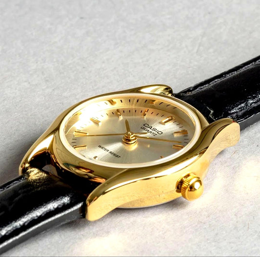 Casio LTP-1094Q-7A vintage analog watch with gold brass case and genuine leather band