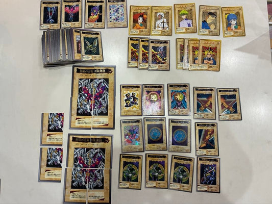 Bandai Yu-Gi-Oh Carddass collection of 169 vintage cards displayed in a fan layout