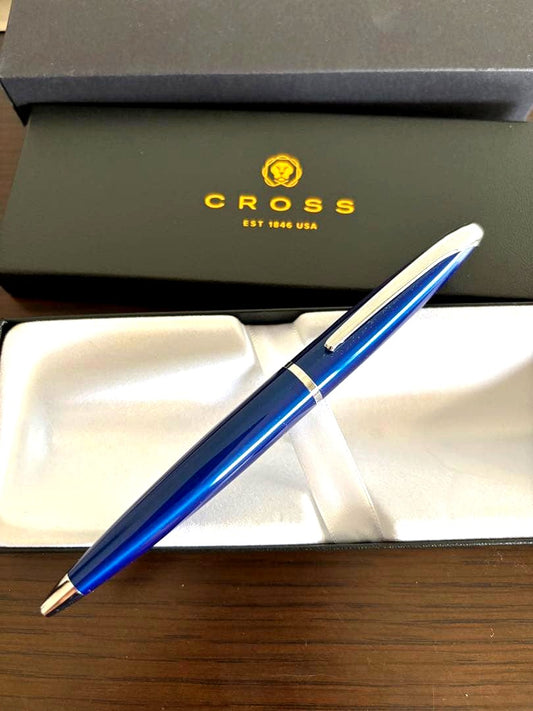 Cross blue metal ballpoint pen with gift box shown on white background
