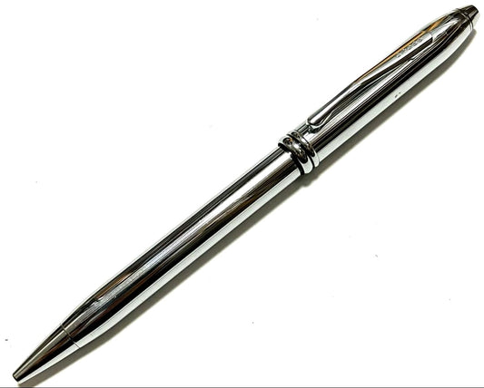 Cross Townsend chrome ballpoint pen with visible wear and chrome finish