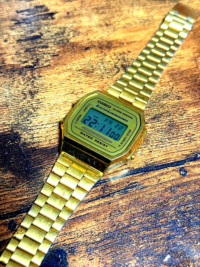 Casio A168WG-9WDF gold vintage digital watch with gold bezel, band, and digital display