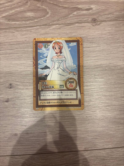 Bandai One Piece trading card showing Nami as Unwanted Bride in a wedding dress with Wisdom attribute
