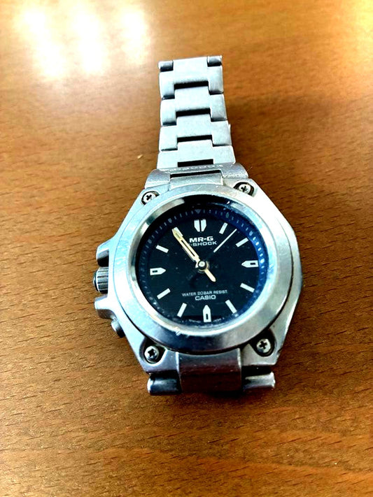 Vintage Casio G-Shock Mr-G analog wristwatch with analog display and no visible scratches