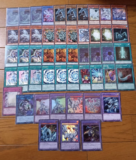 Blue-Eyes Ritual Deck pre-constructed cards including Ultimate Dragon Mage and Ultimate Dragon Knight with minor scratches