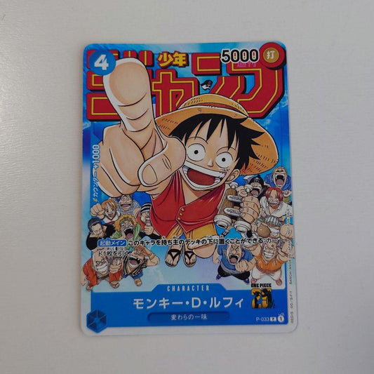 Bandai Monkey D. Luffy P-033 promo card from Japan stored in a card case with visible slight corner bends