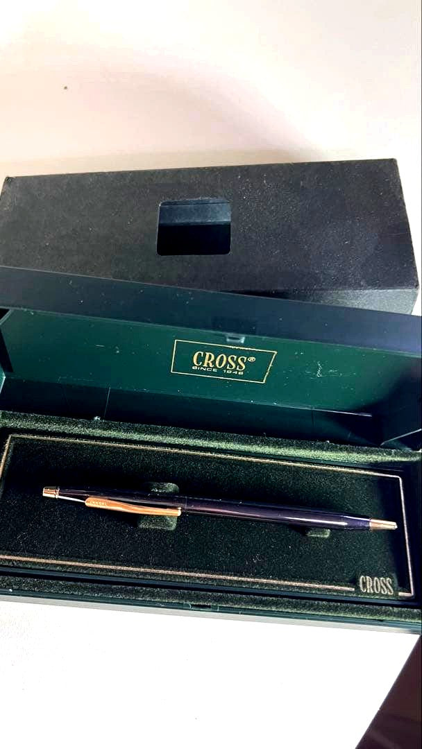 Cross Century twist ballpoint pen in matte black and gold with sleek design