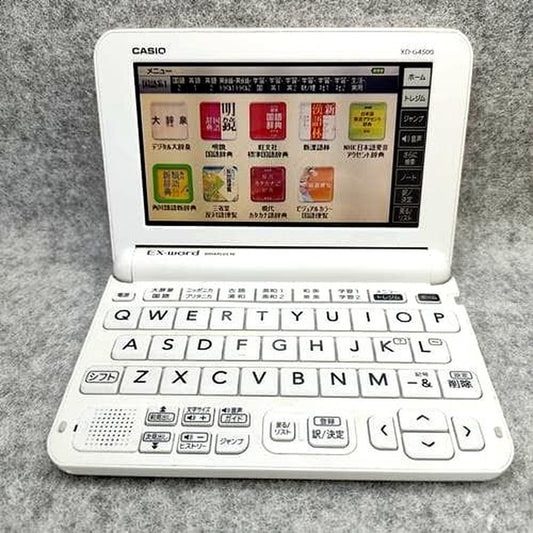 Casio XD-G4500 electronic dictionary for middle and high school students with visible scratches and wear