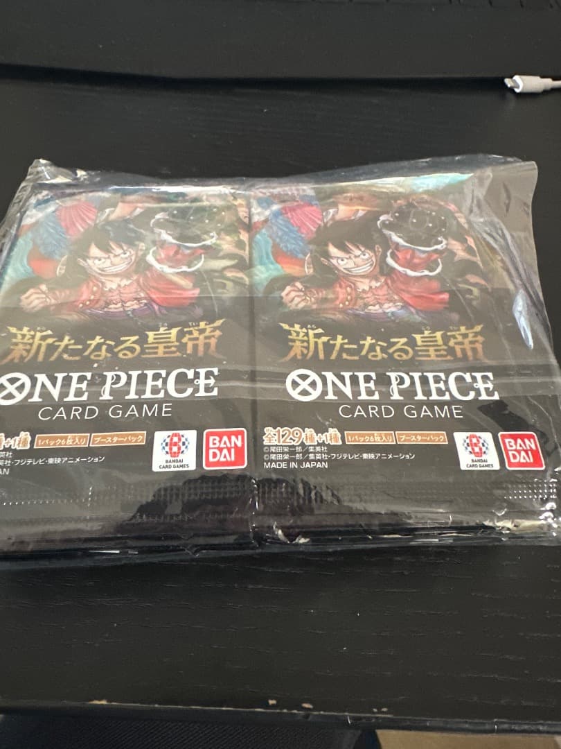 Bandai New Emperor One Piece Card Game single card pack set from Japan with official packaging