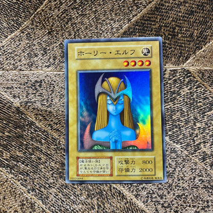 Yugioh Holy Elf Initial ③ card in used vintage condition from Japan import shown diagonally